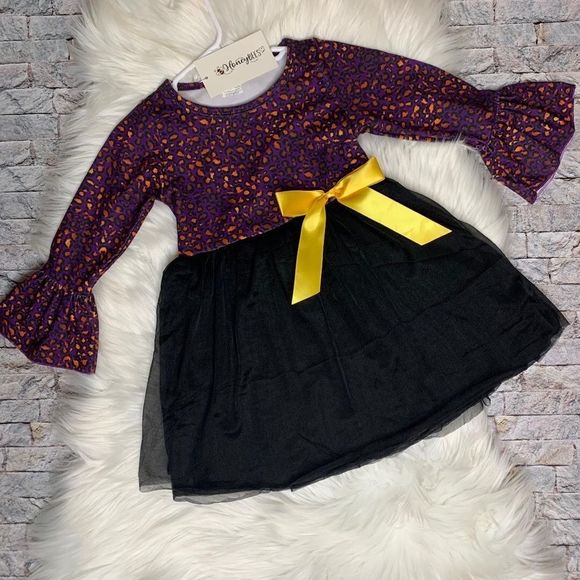Girls Lovin’ Leopard Boutique Tutu Dress in purple, black and oranges.